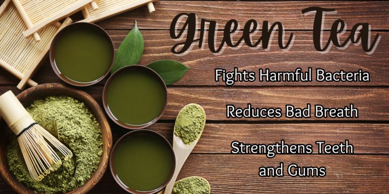 Green tea in a cup with fresh leaves, recommended by 63304 dentist for its benefits for dental health and oral hygiene.